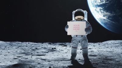Astronaut Holding Paper Sign Mockup in Space