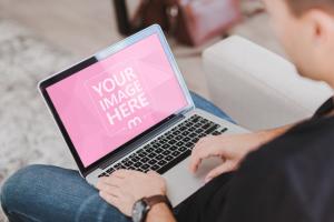 Man Working on Macbook Laptop Mockup
