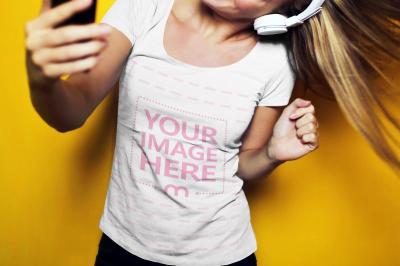 T-Shirt Mockup Generator with Young Woman Taking a Selfie