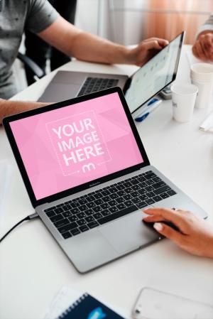 Working with Macbook Laptop in Office